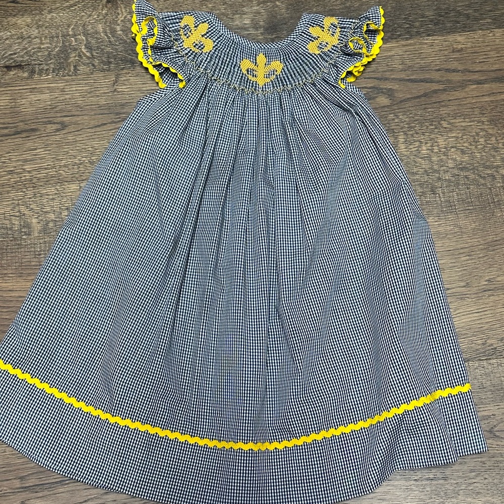Black, Yellow, & White Smocked Gingham Dress with Fleur De Lis. Saints.